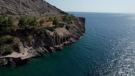 aerial circle view of ieranto bay with people take time relaxing