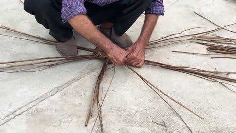 traditional woven basket making art natural material eco wicker furniture mat heritage skill wooden bushes branches of pomegranate tree plant local people life spent by selling handicraft middle east