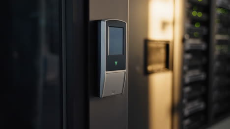 biometric access control device in a data center with status indicators