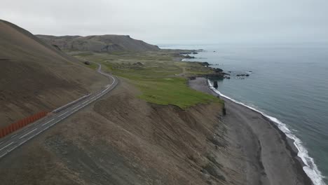 driving on an empty road in a gloomy day around the south icelandic coast