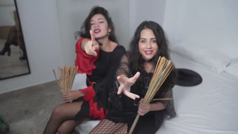 two women in witch costumes