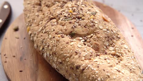 healthy seed bread on wooden board