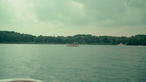 Passing-by-a-boat-of-people-on-the-lake