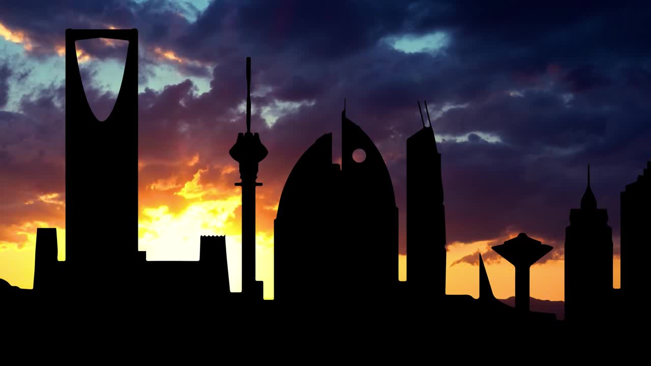 사우디 아라비아의 리야드 시의 스카이 라인, 은 태양과 불타는 하늘과 함께 해가 지는 시점.