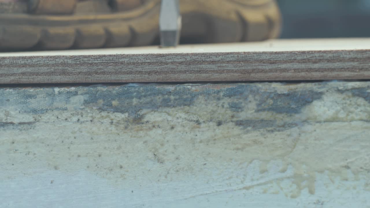 Plywood edge close up securing using brass screw