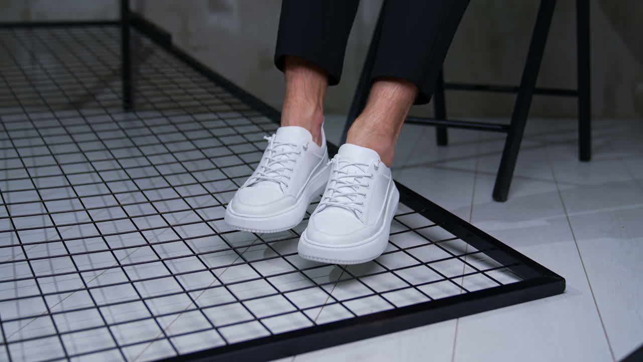 White Leather Sneakers on Display