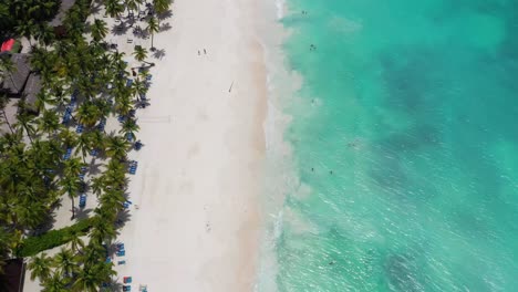 playa del gato beach resort area in sanoa island dominican republic, aerial top view flyover shot