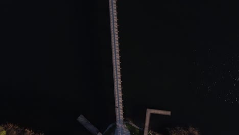 Aerial-shot-of-bridge-connecting-two-islands-in-the-lake