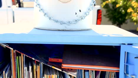 tilt down of close up of robot library with doors open to view the books inside