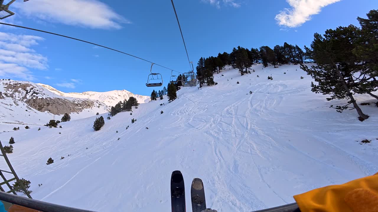 Skiing on a Snowy Mountain with a Ski Lift