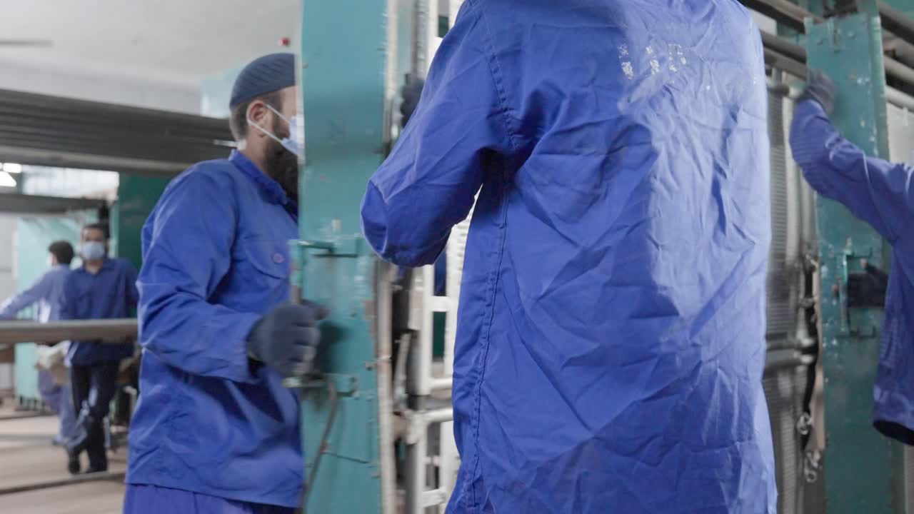 Leather stretching process by workers in Pakistan South Asia manual work