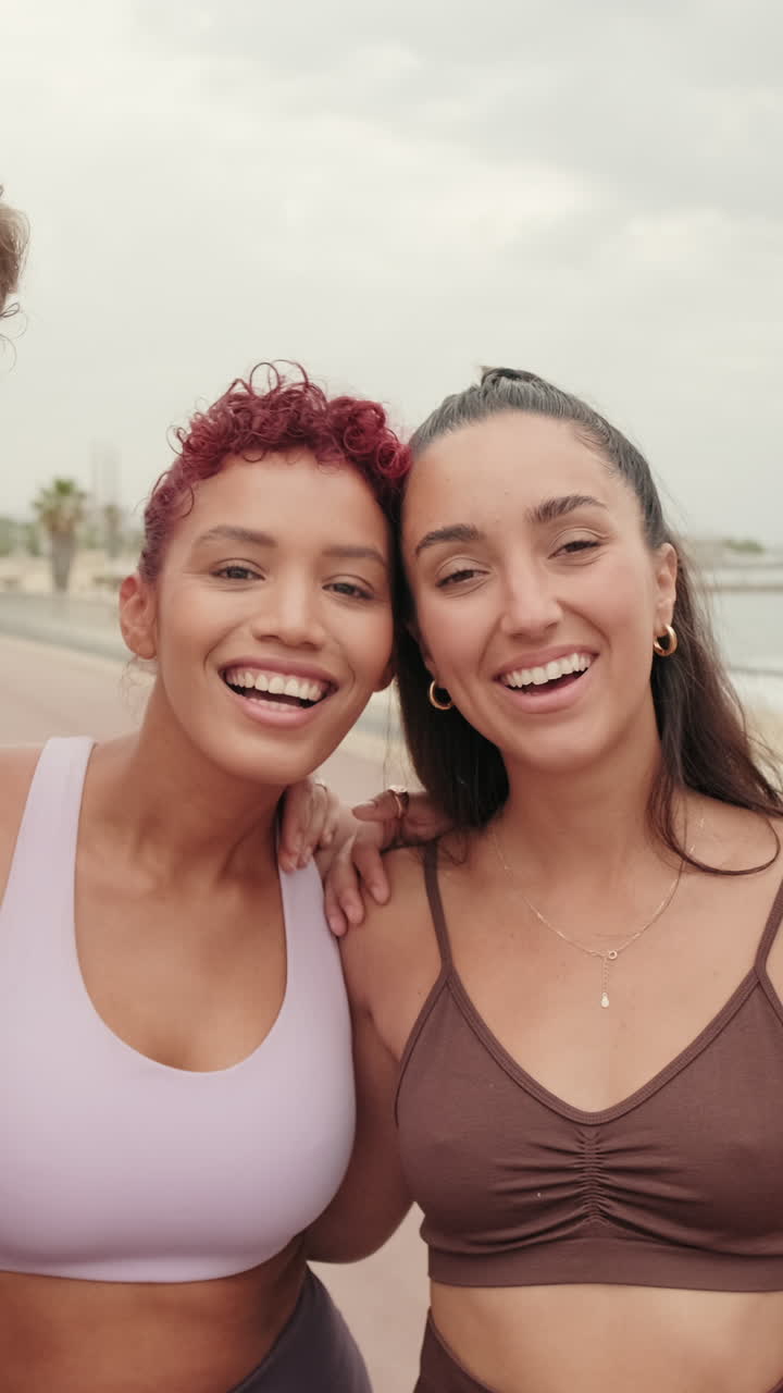 Friends Embracing by the Beach After Fitness