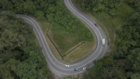 traffic on malaysian highway drive around loop in highway, aerial view