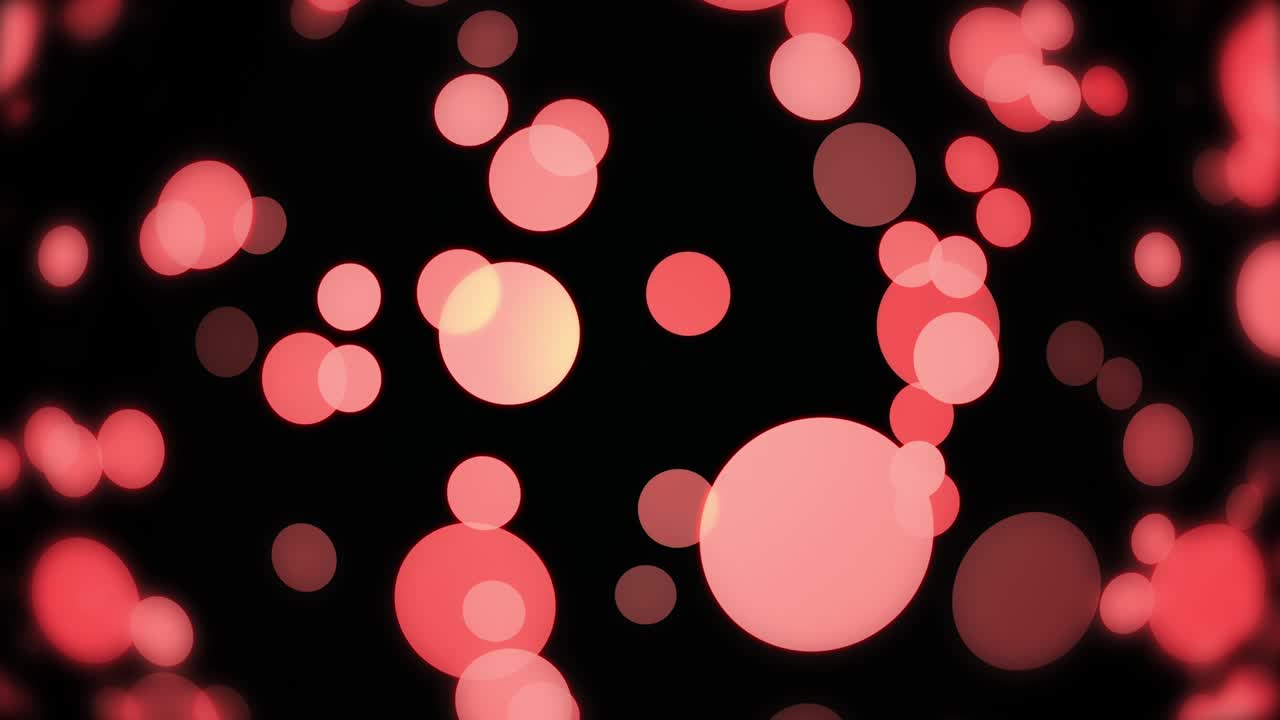 slow motion of glowing bokeh flying on black background