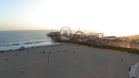 Panoramic view of Santa Monica Pier and beach at sunset