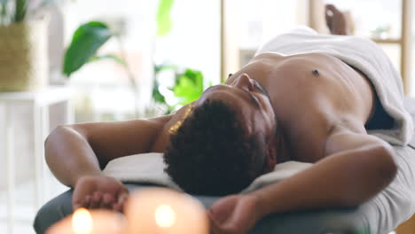 masseuse placing an acupuncture needle