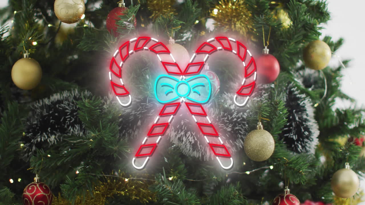 Animation of neon candy canes over christmas tree and decorations