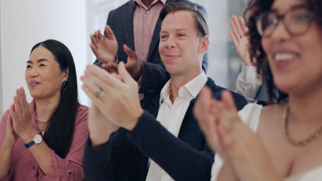 people applauding at a business meeting