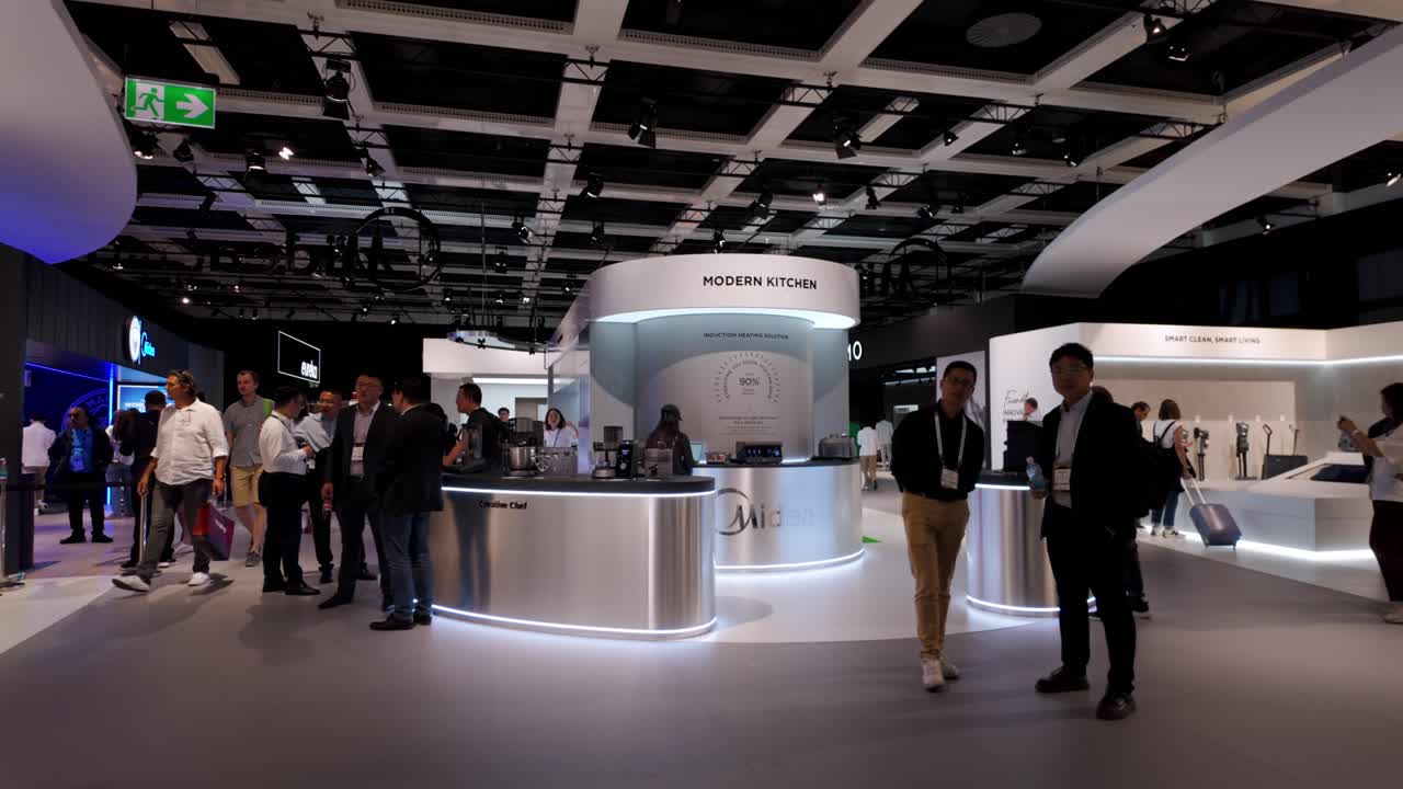 People attending to what's next at Midea Pavilion at IFA Berlin 2024 Messedame