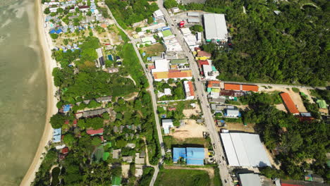 Slow-morning-traffic-in-party-island,-aerial-drone-view