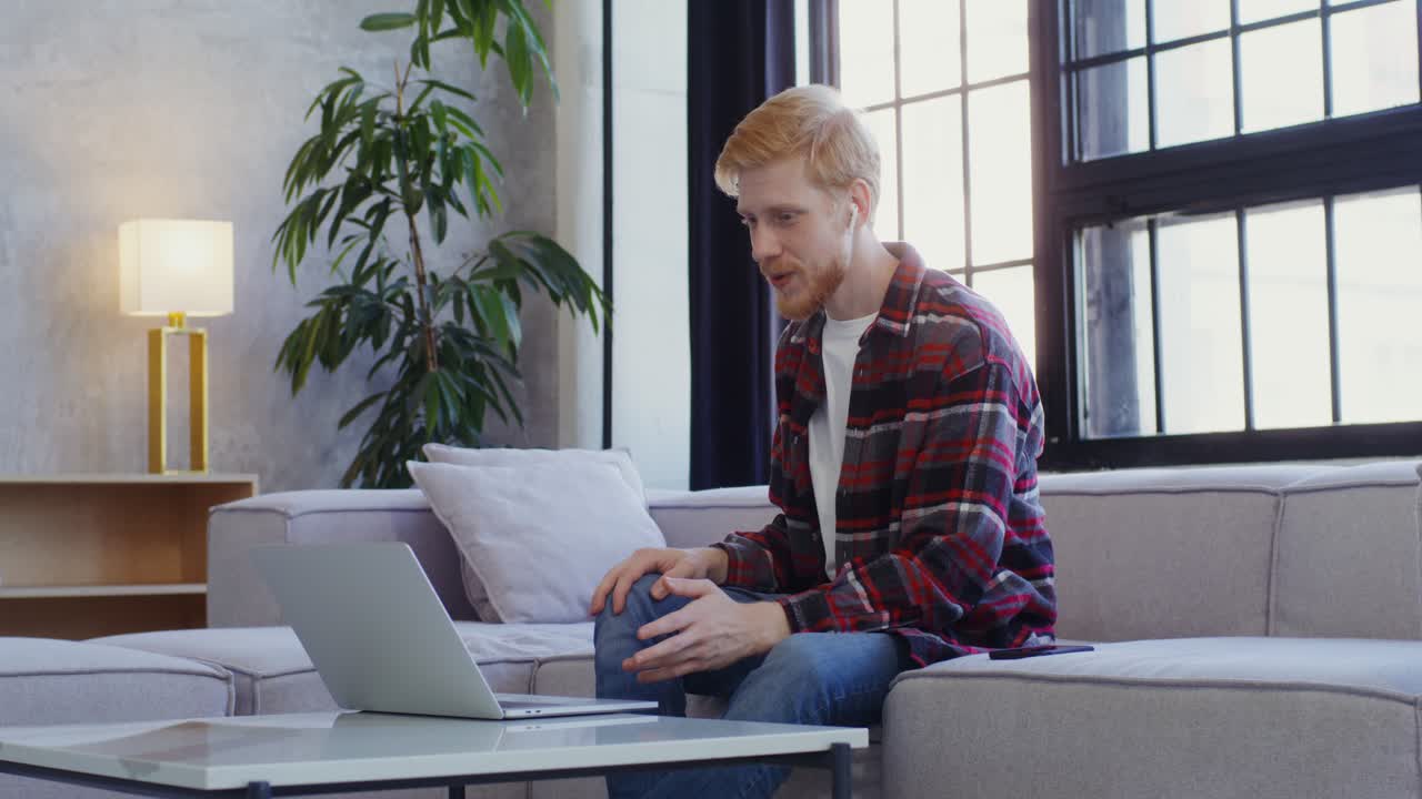 Man having a video call at home
