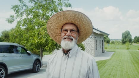 smiling senior man in a garden