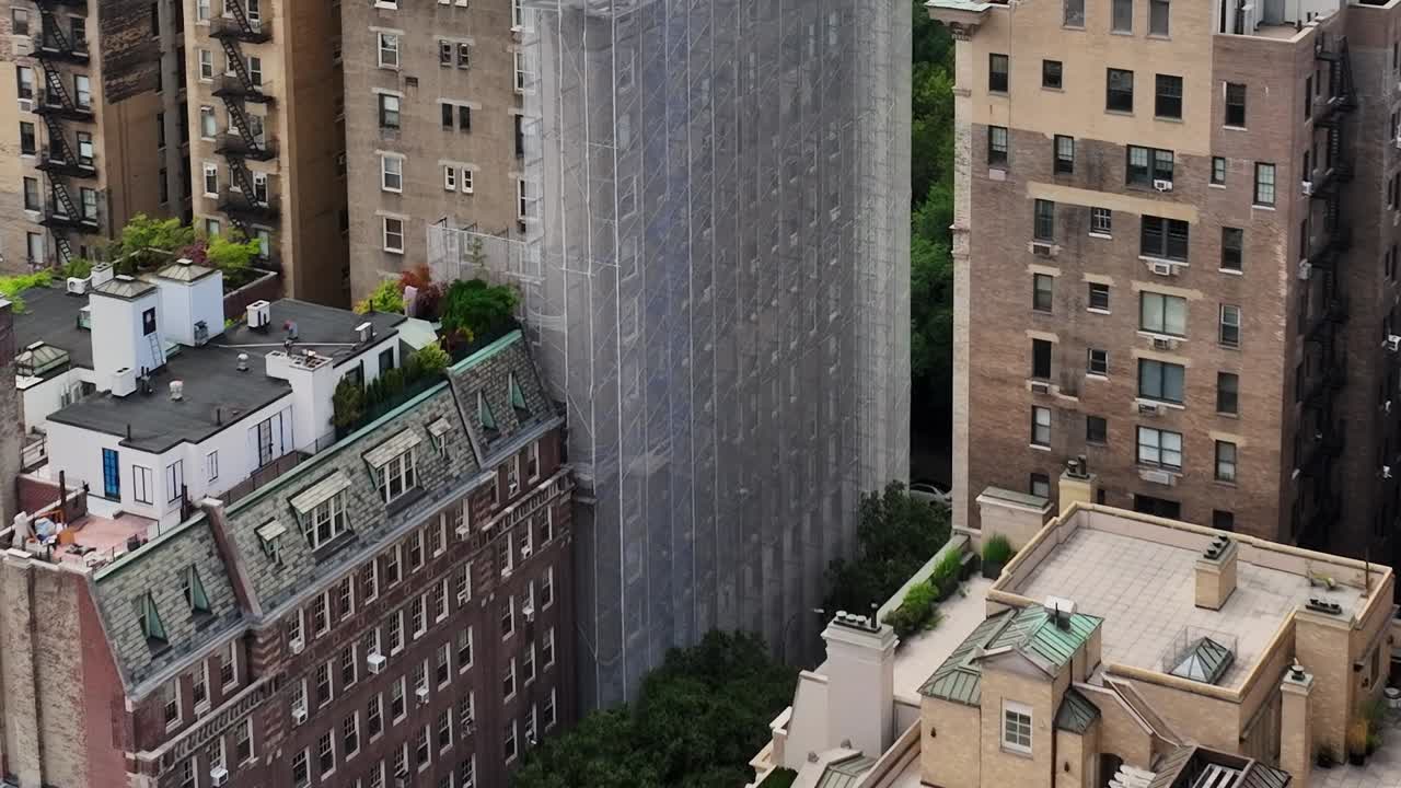 Drone view of urban landscape featuring buildings in New York City