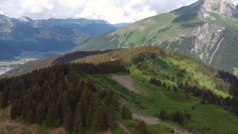 Drone-Shot-of-Mountain-Bike-Trails,-Forests-and-Mountains