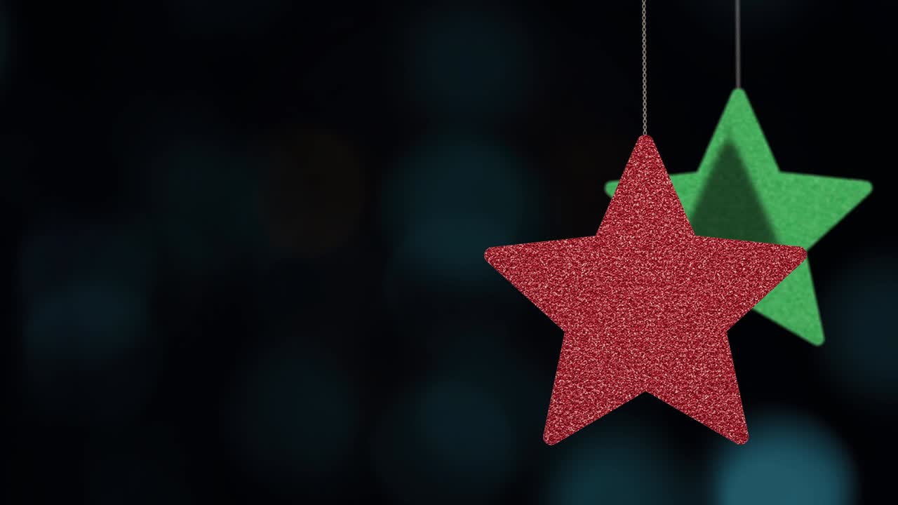 los adornos de las estrellas de navidad se mueven en el fondo de bokeh.