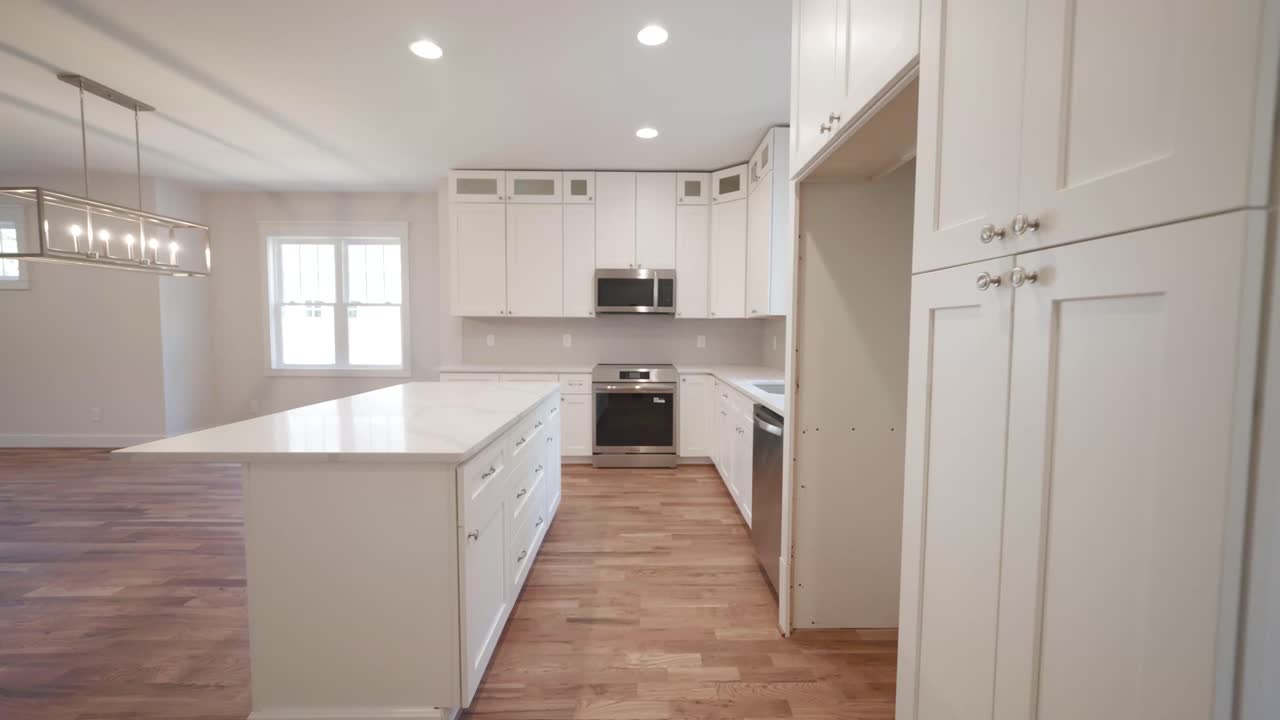 Modern Kitchen Interior with White Cabinets and Countertop