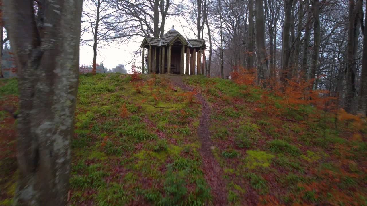 Tracking shot of an isolated wooden hut in Northumberland