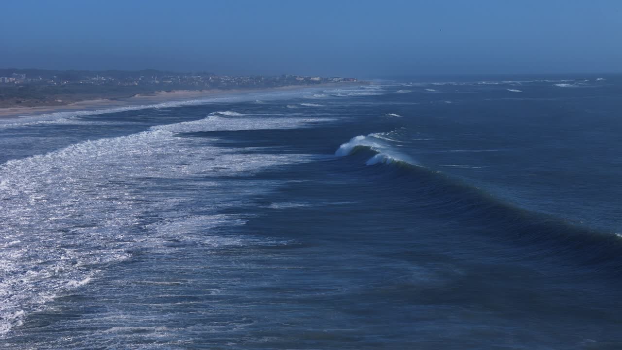 Waves breaking on Porto 70mm lens