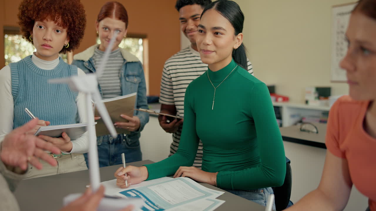 Students collaborating on renewable energy project in classroom