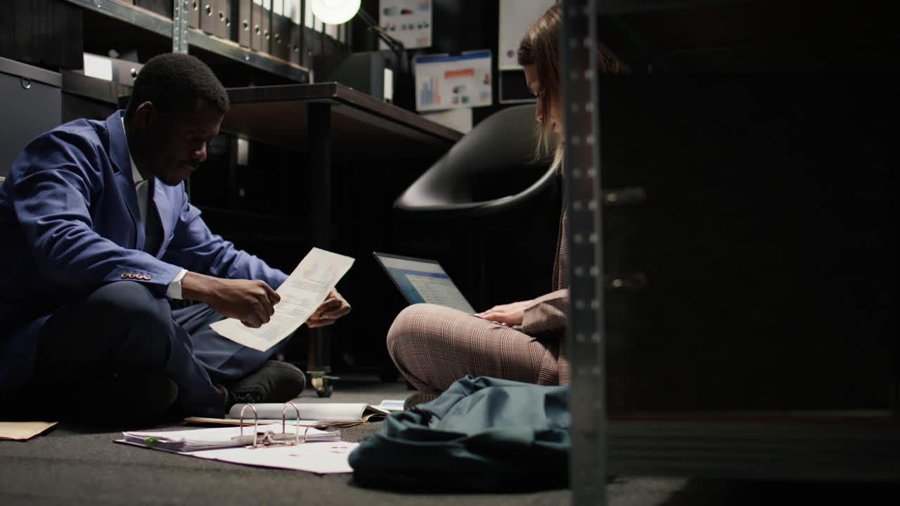 Business meeting in a dark office