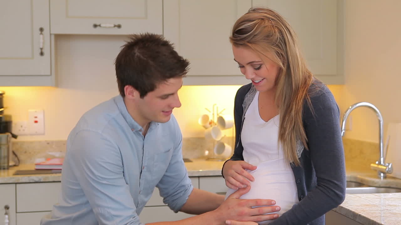 Baby kicking in mothers stomach