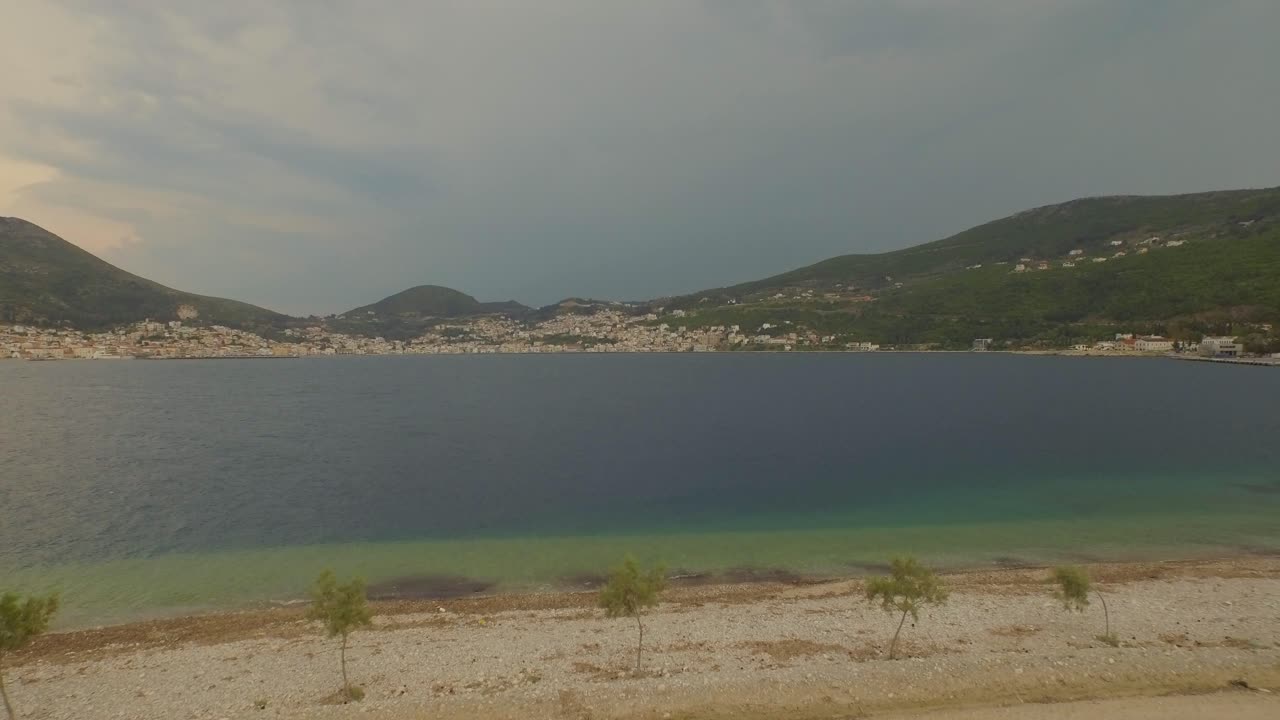 Aerial: Thunderstorm coming in on Samos city