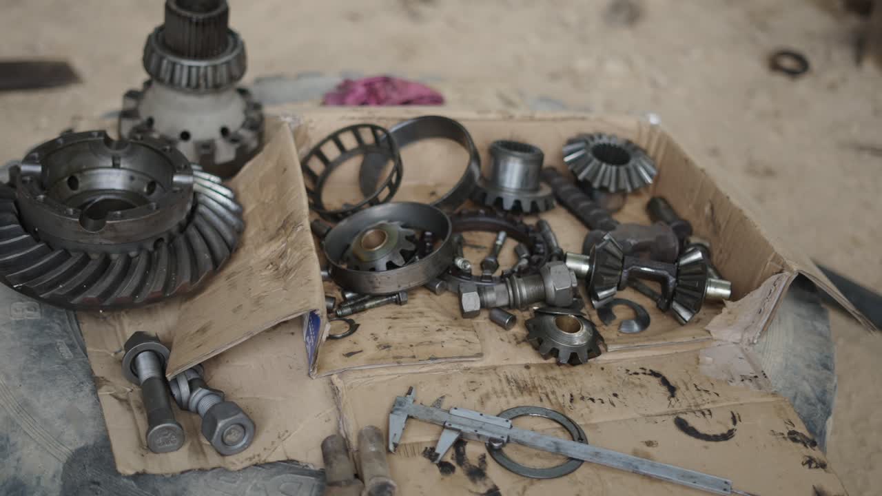 Disassembled Transmission Parts and Tools