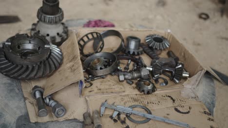 disassembled transmission parts and tools