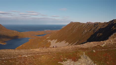 scenic view of vestarelen with tourists exploring the mountain landscape and coastline