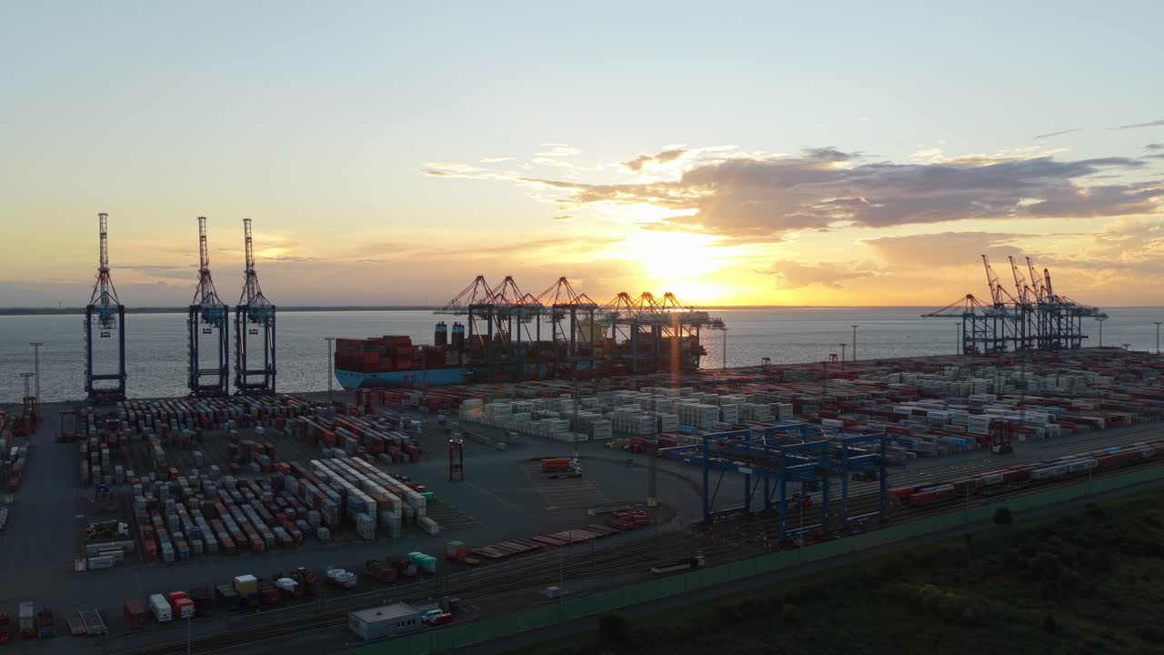 Busy container port at Bremerhaven with ships and cranes at work