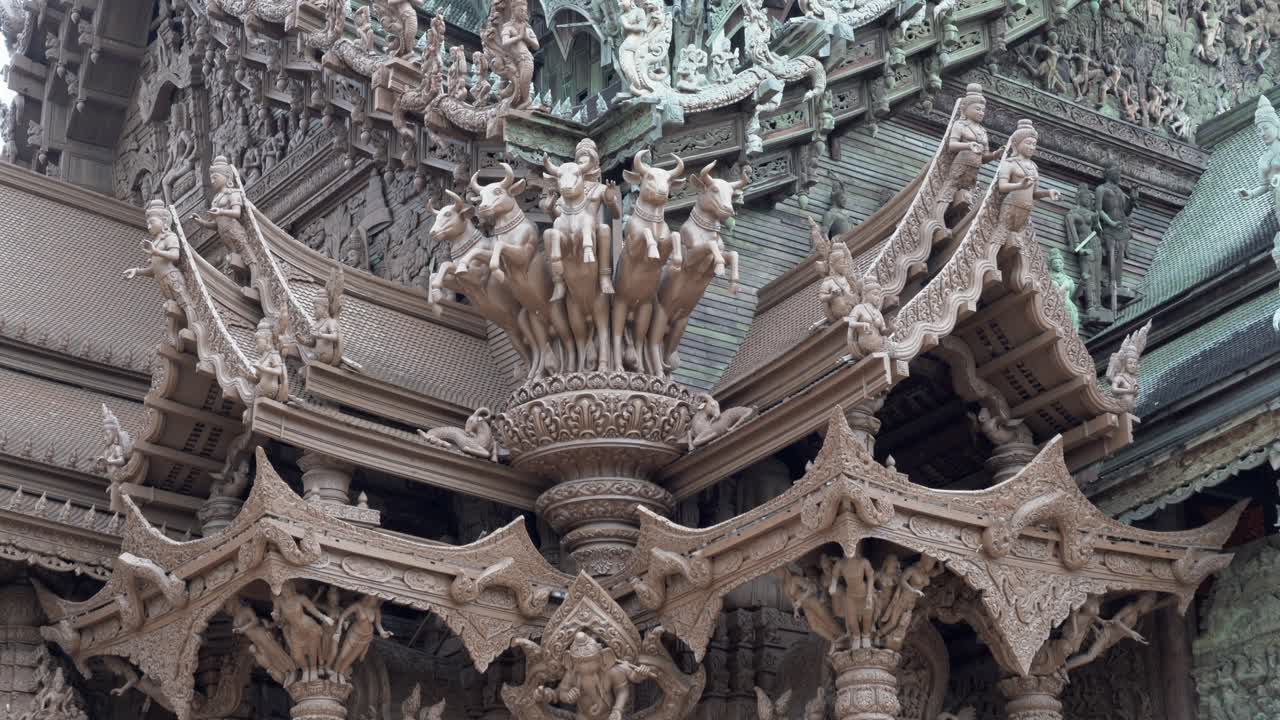 Beautiful exterior details of Sanctuary of Truth,zooming out at Pattaya,Thailand, Wooden temple by the ocean.