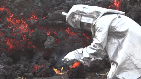 a man in a lava flows from the cabo verde volcano erupts on cape verde island off the coast of africa