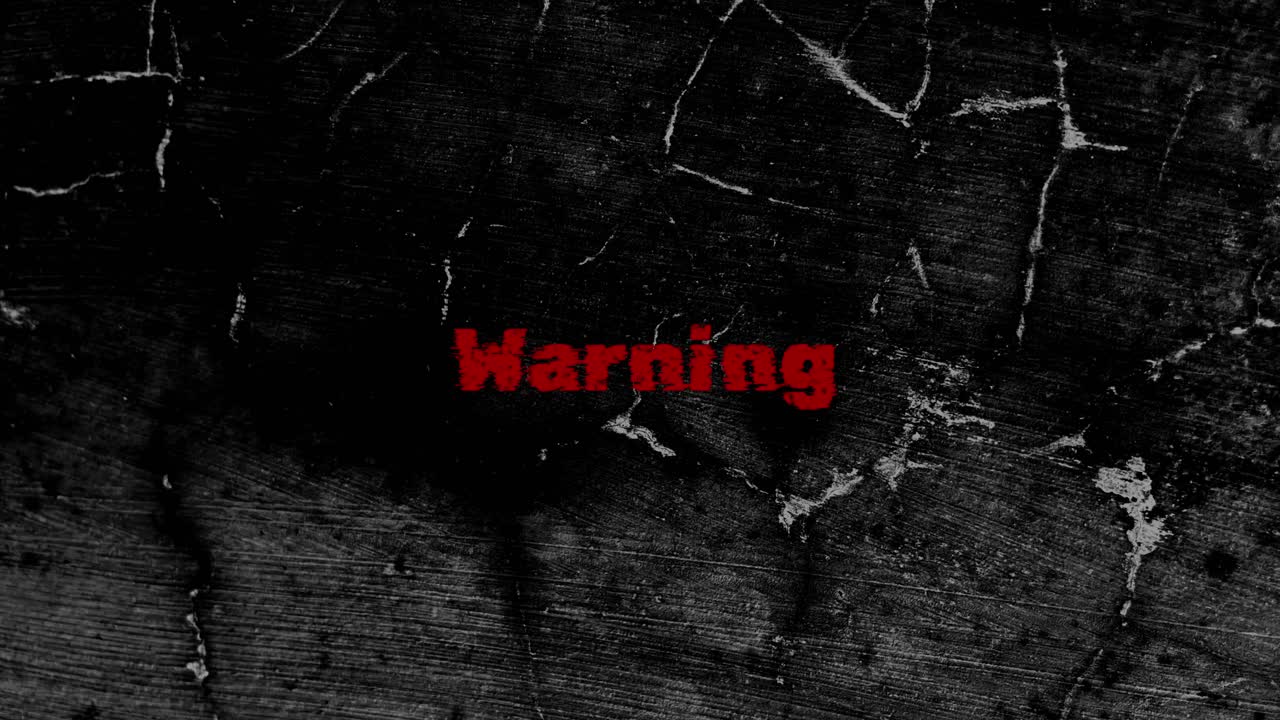 Flickering Red Warning Text on Dark Grunge Background
