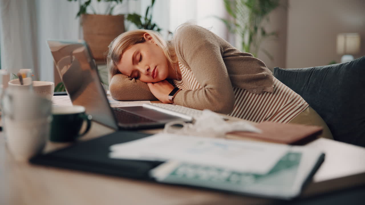Tired Woman Sleeping at Her Desk