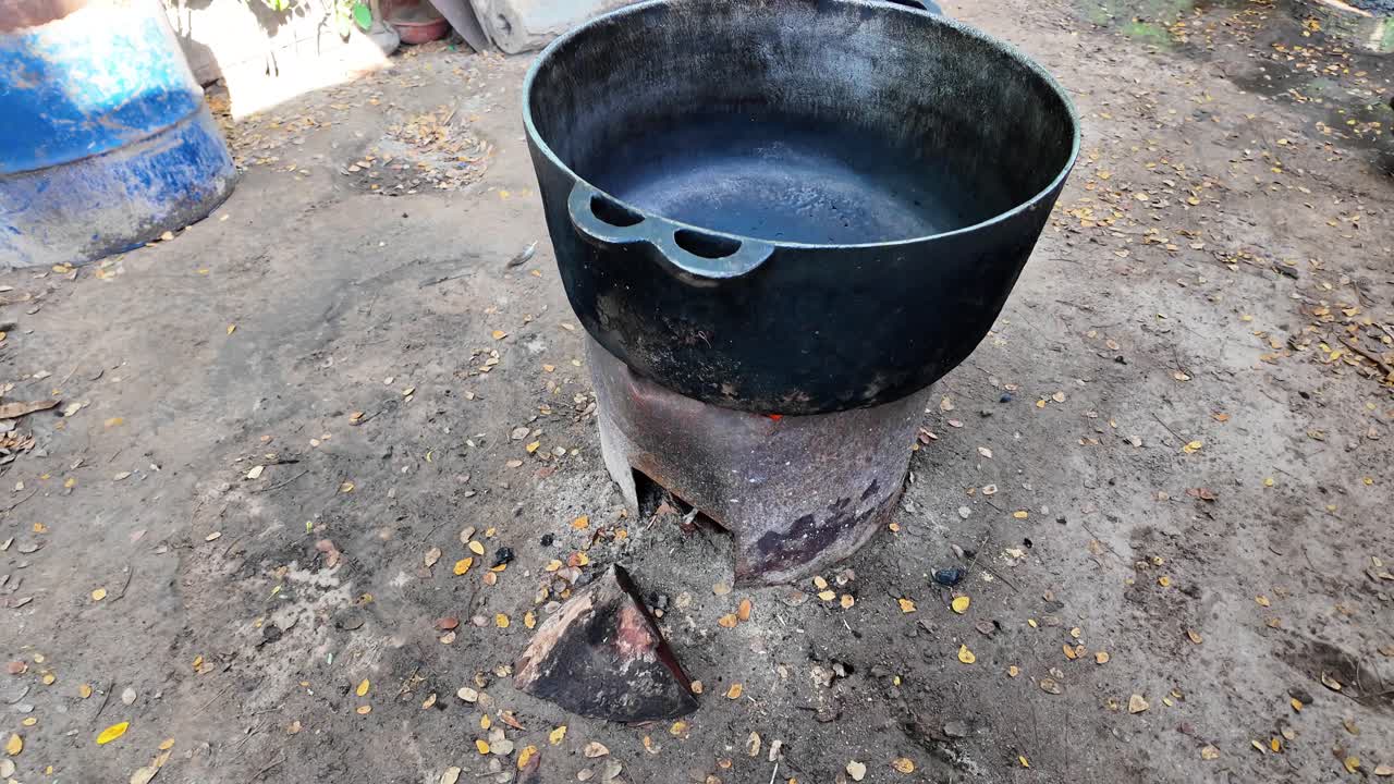 Farm Cooking: A Large Pot on a Hand-made Outdoor Stove