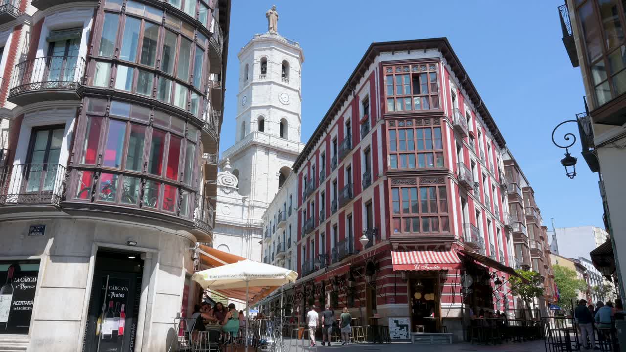 Street view of a sunny panoramic view of Cascajeras Street with the Valladolid Cathedral in the background, Valladolid, Spain.
