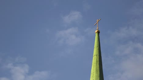 church spire against a cloudy sky