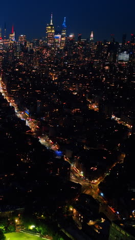 night new york city aerial view. perspective of new yorl scyscrapers street.