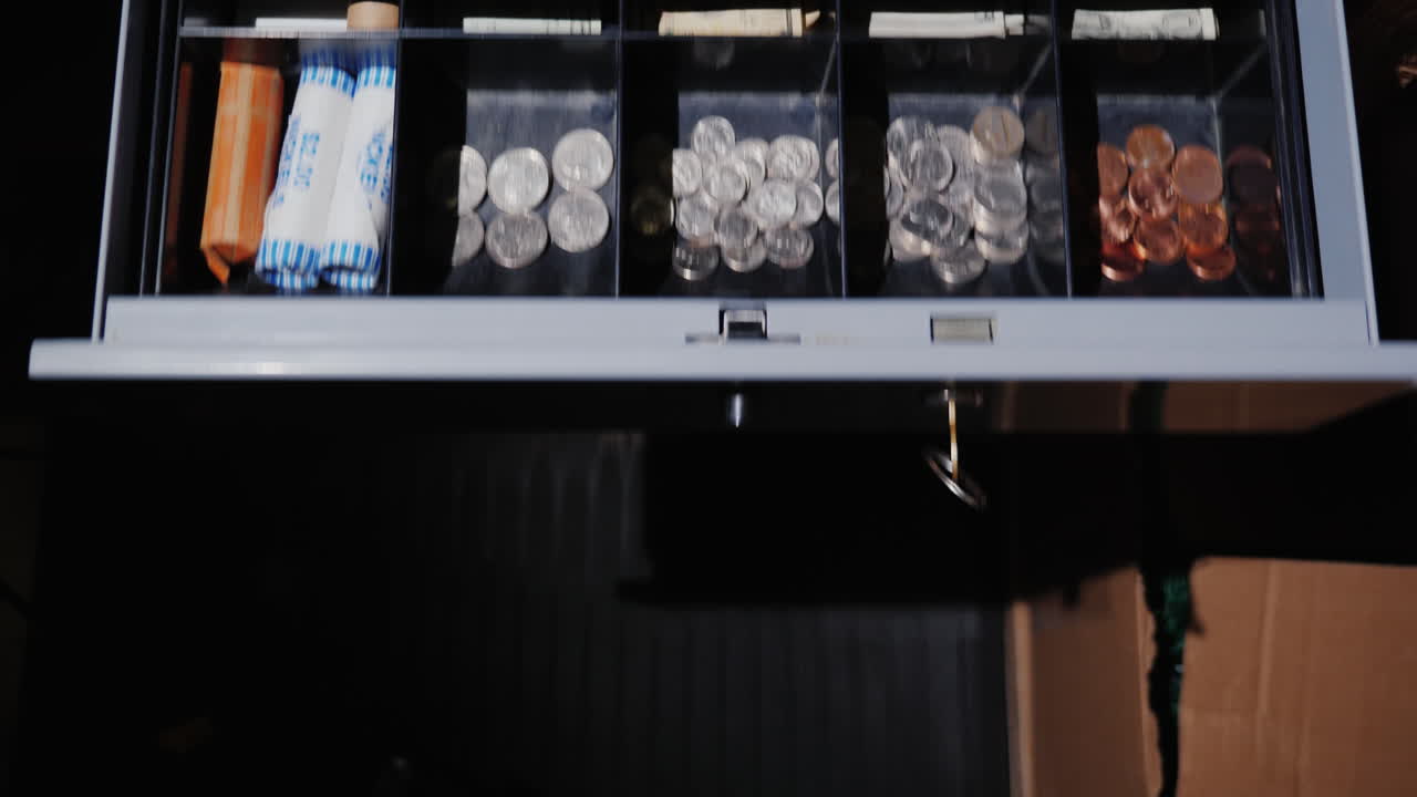 Working At The Cash Register With Us Dollars