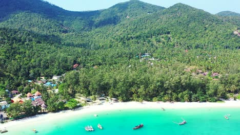 Peaceful-Thailand-island-beach,-white-sand-turquoise-sea-and-palm-plantation